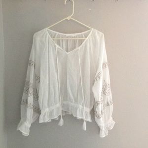 Sheer puff sleeve top, great layering with vest